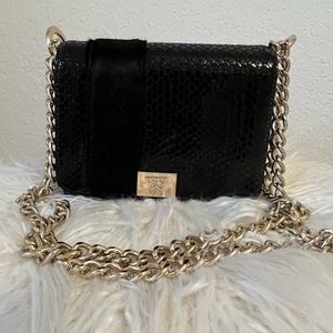 Kelly Wynne Game Changer Mini black snakeskin leather handbag